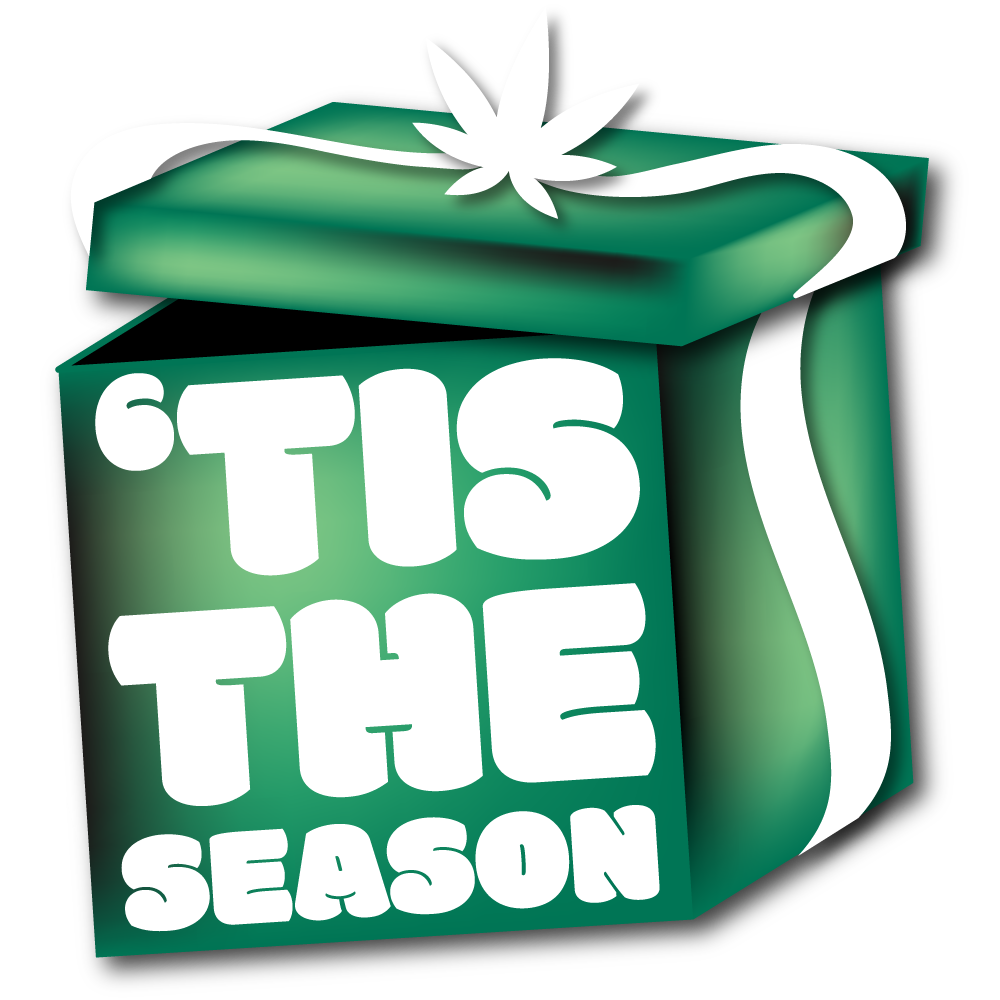 Green present box that reads: 'tis the season