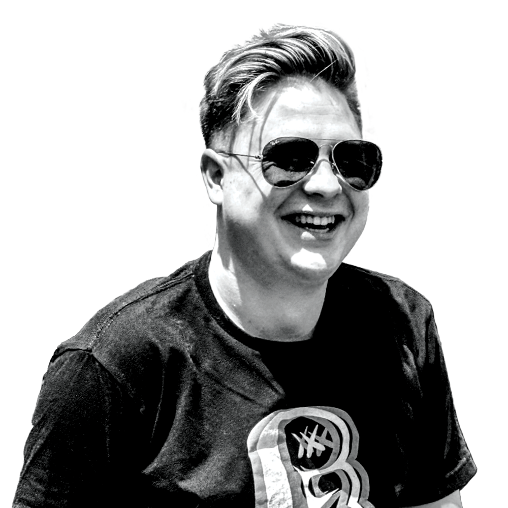 Smiling budtender wearing a white Verilife t-shirt