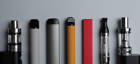 Row of different types of vape pens