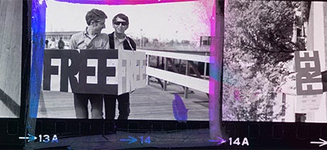 Photograph of two men protesting for gay rights