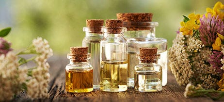 Colorful perfume bottles sitting on a table