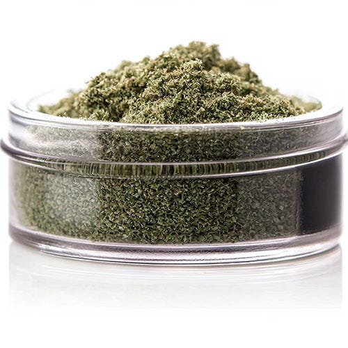 Clear jar filled with marijuana kief