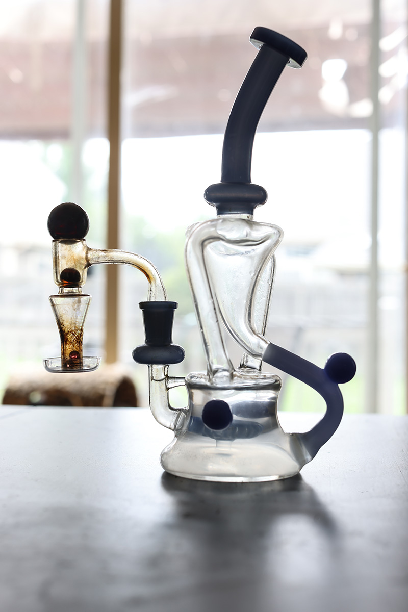 Glass dab rig on a table