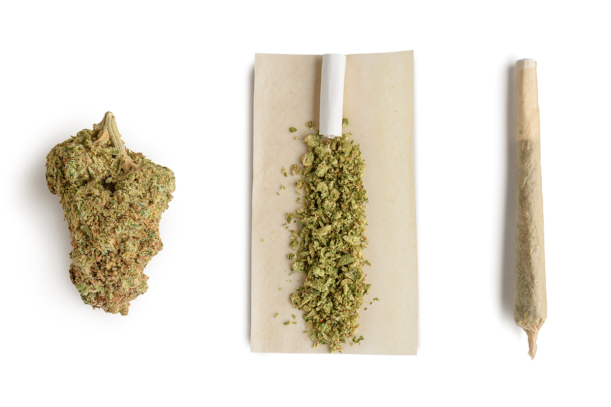 Flower, ground flower in rolling paper, completed joint