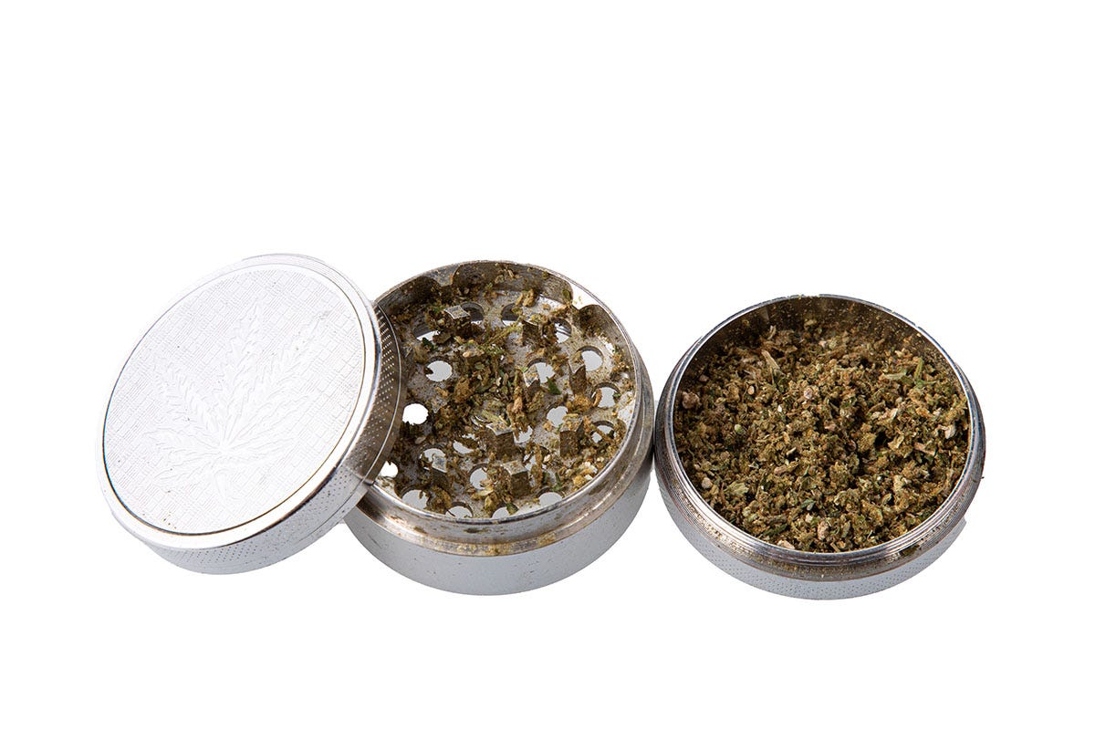 Disassembled cannabis grinder