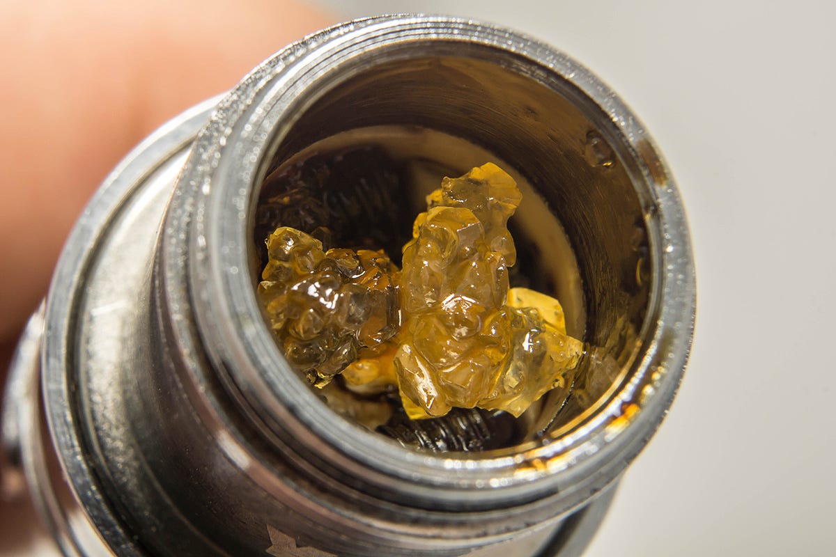 THCA diamonds being loaded into a dab pen
