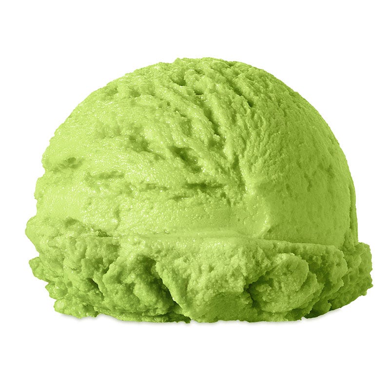 Scoop of green gelato on a white background