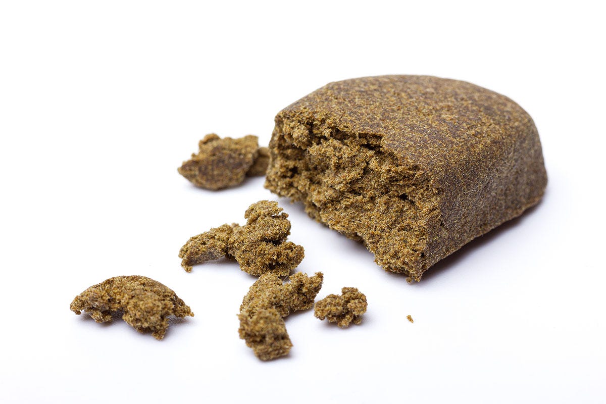 Brick of hash with pieces crumbling off