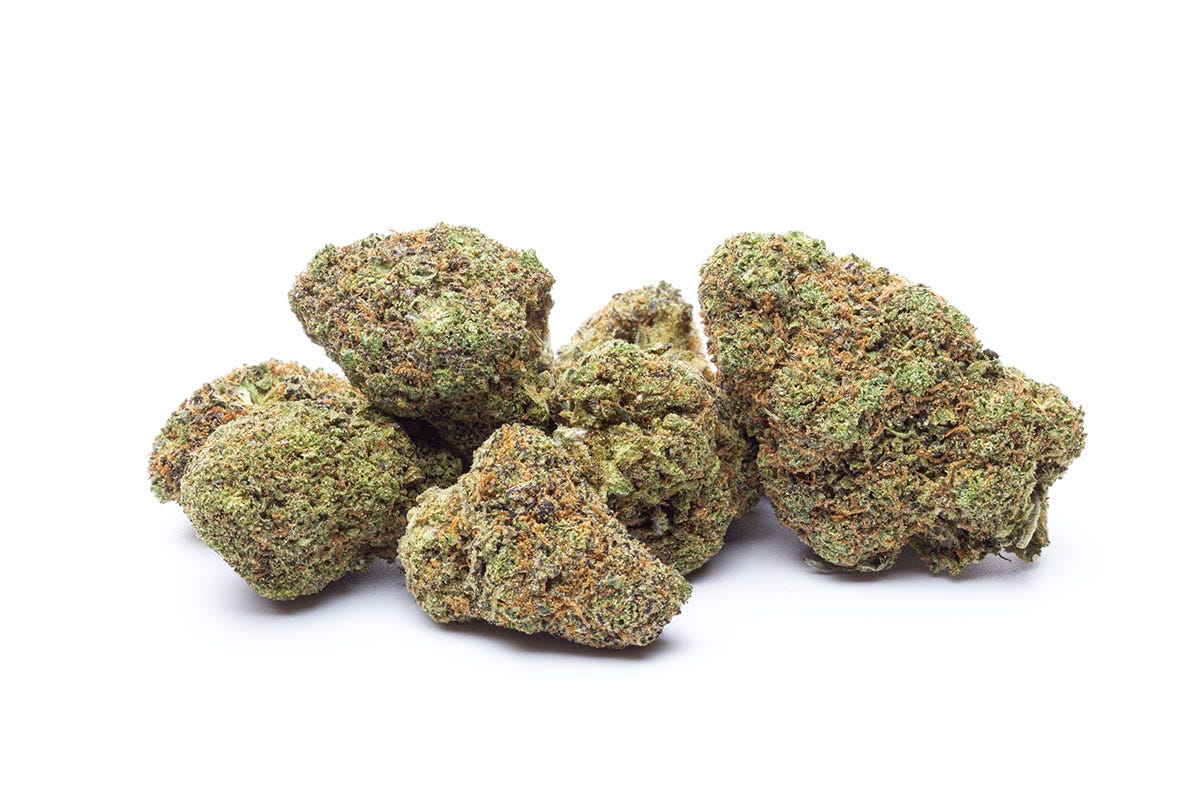 Quarter of marijuana flower on a white background
