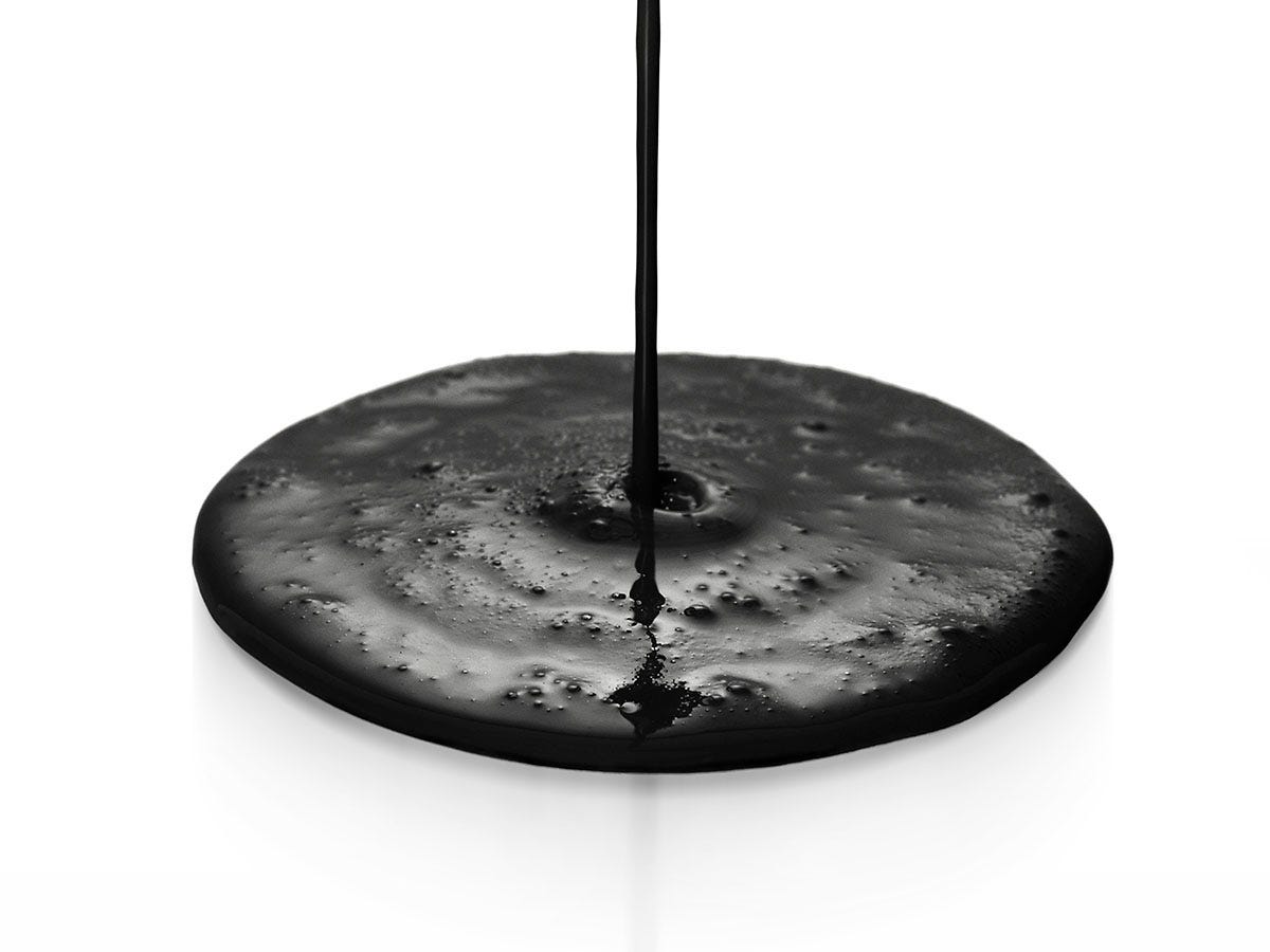 Black tick simpson oil pooling on a white table