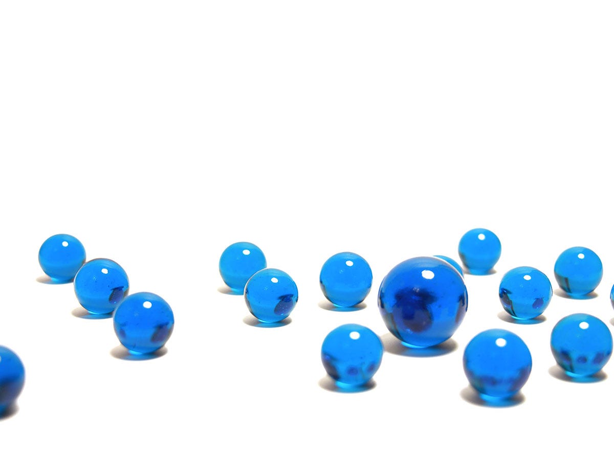 Blue terp pearls on a white background